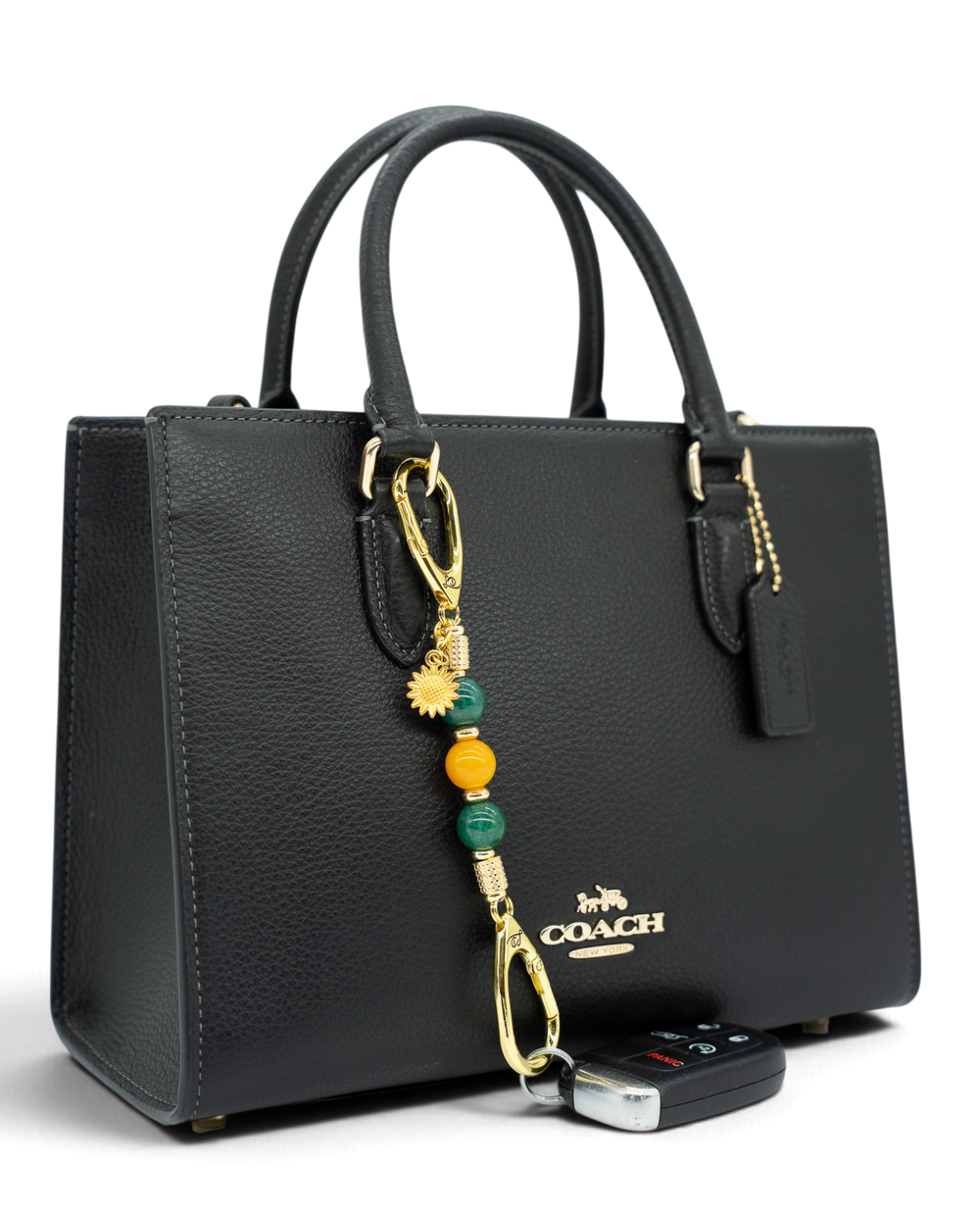 LD Keyfinder Golden Harvest-Mini beaded keychain with green and orange agate beads and a gold sunflower charm on a bag
