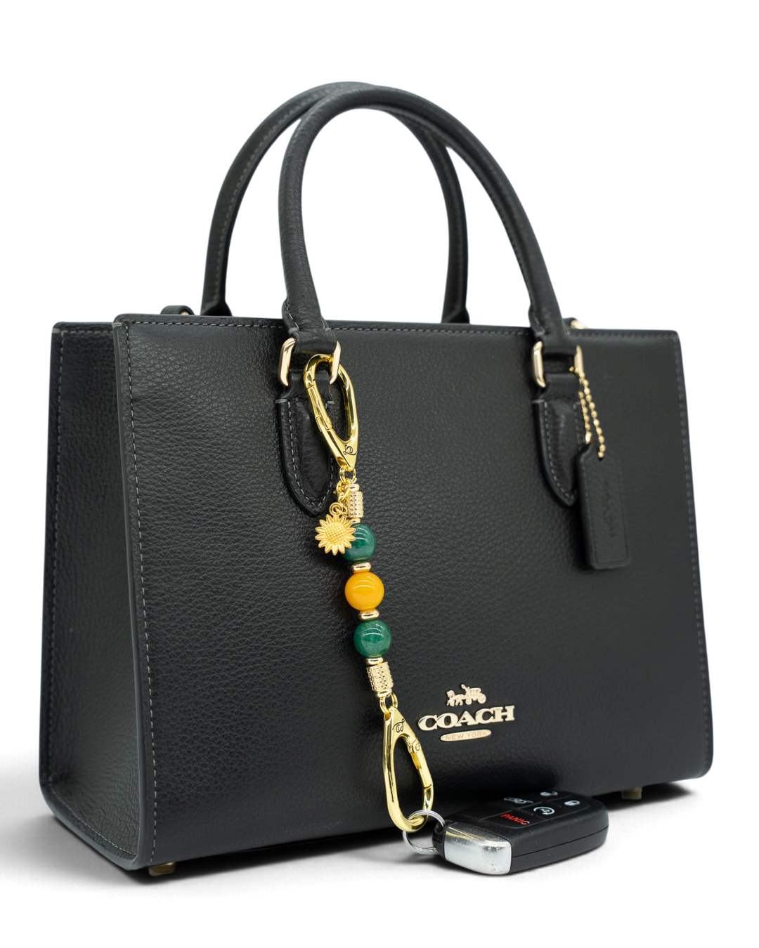 LD Keyfinder Golden Harvest-Mini beaded keychain with green and orange agate beads and a gold sunflower charm on a bag