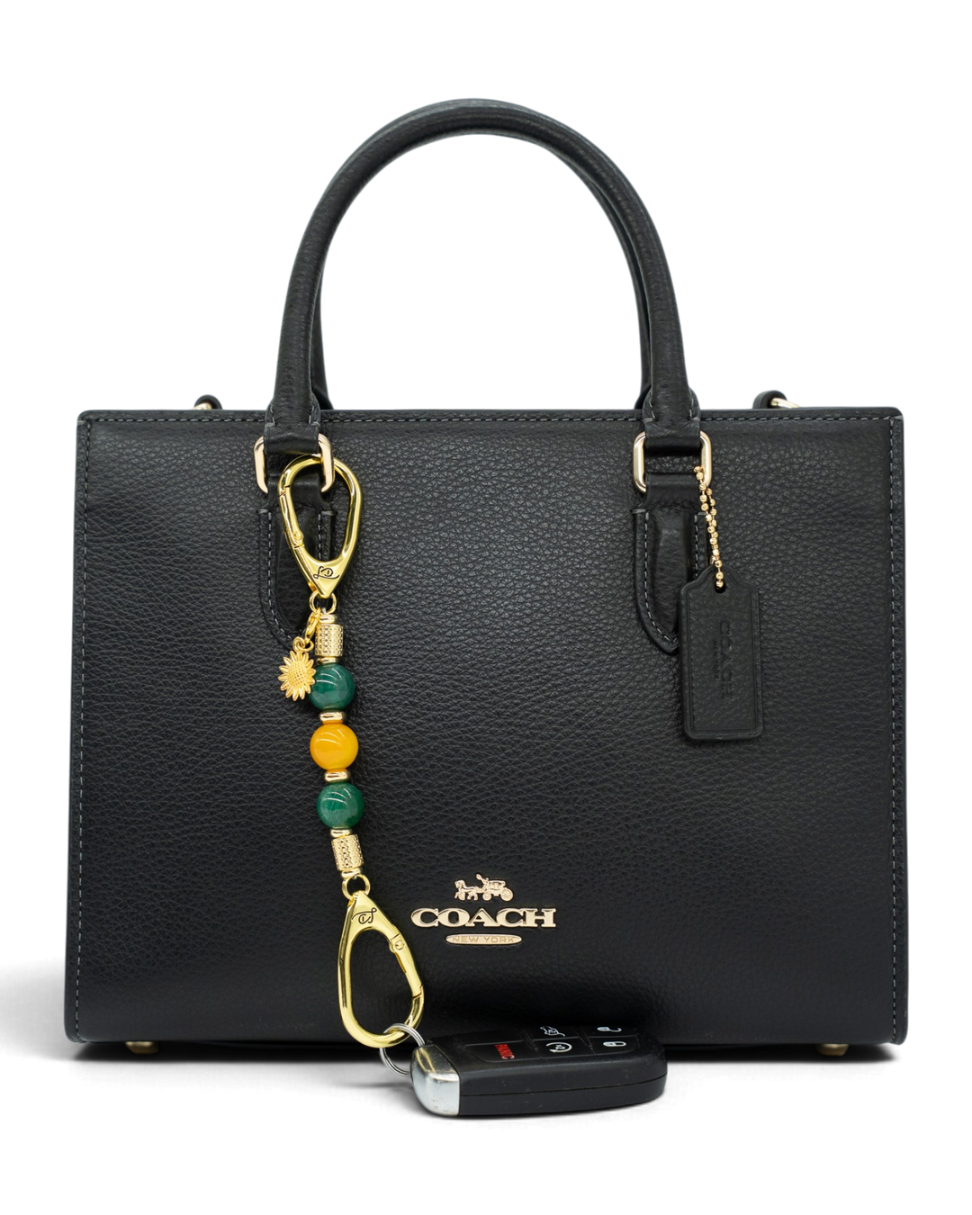 LD Keyfinder Golden Harvest-Mini featuring green and orange agate beads and a gold sunflower charm on a black handbag