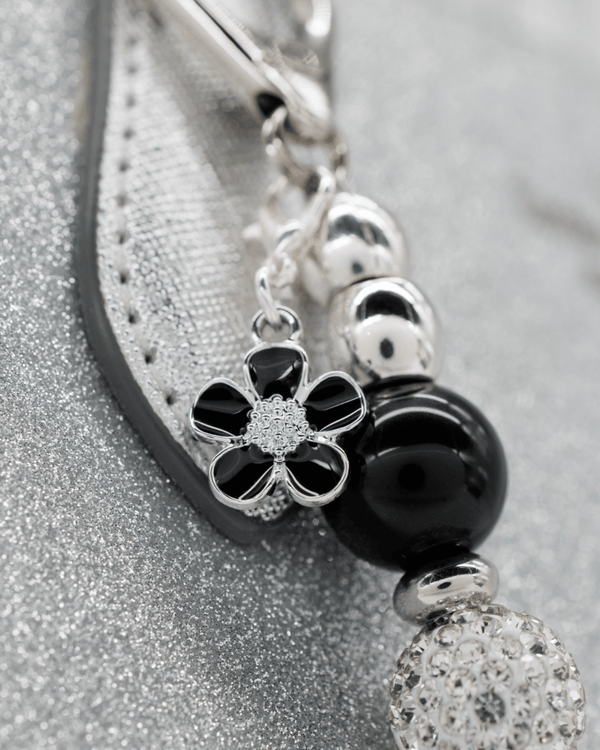 Silver plated black flower charm