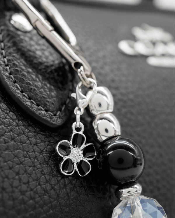 Silver-plated black flower charm