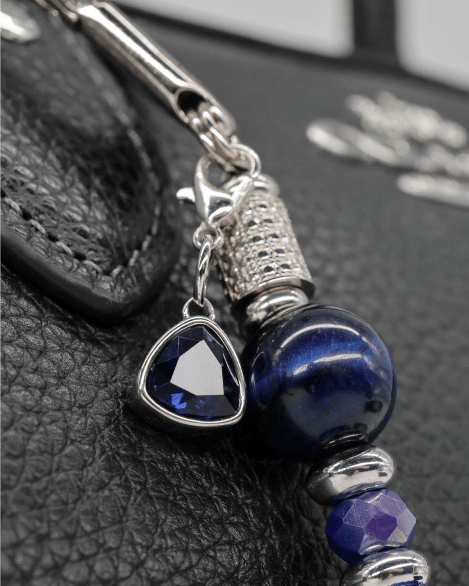 Faceted glass jewel charm