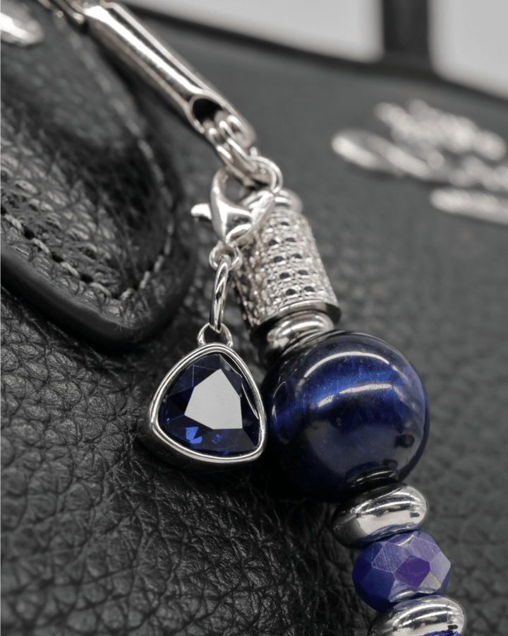 Faceted glass jewel charm