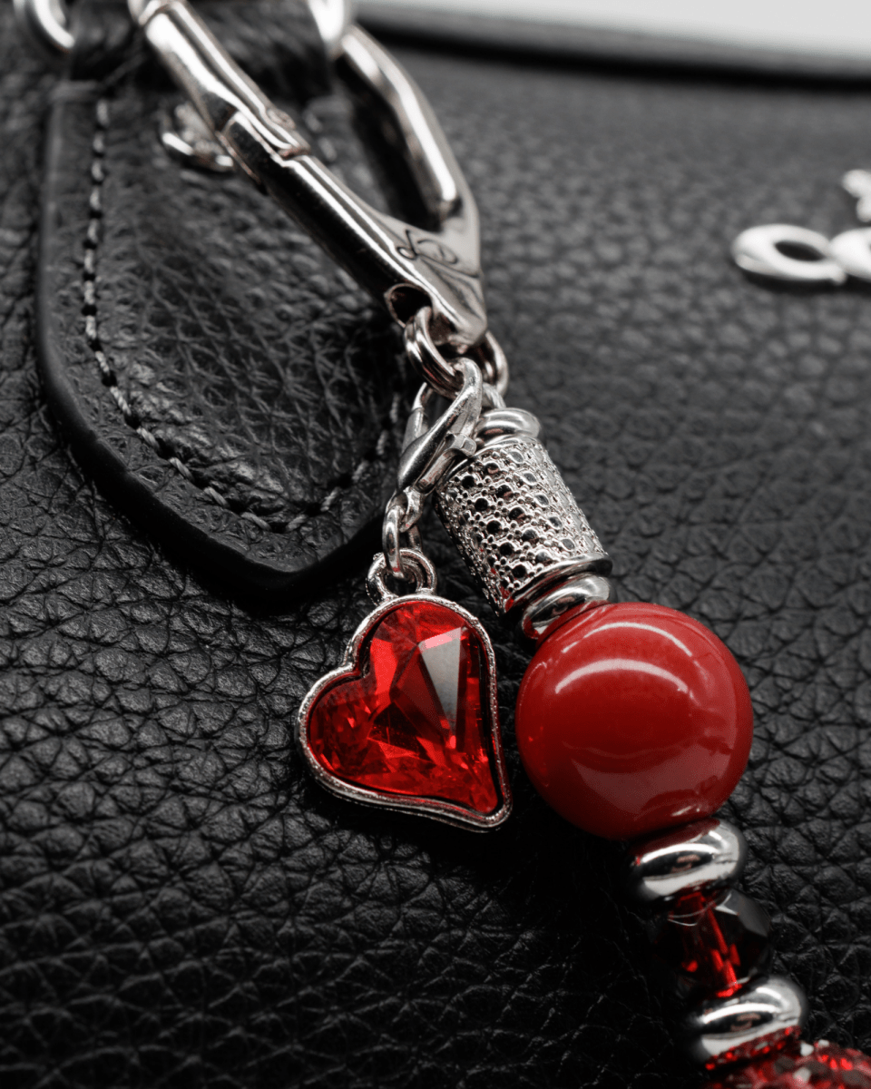 Platinum plated faceted glass heart charm