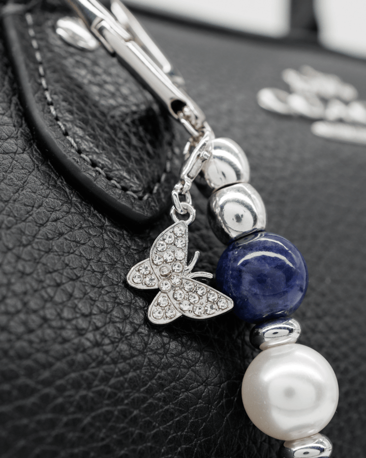 Silver plated rhinestone butterfly charm