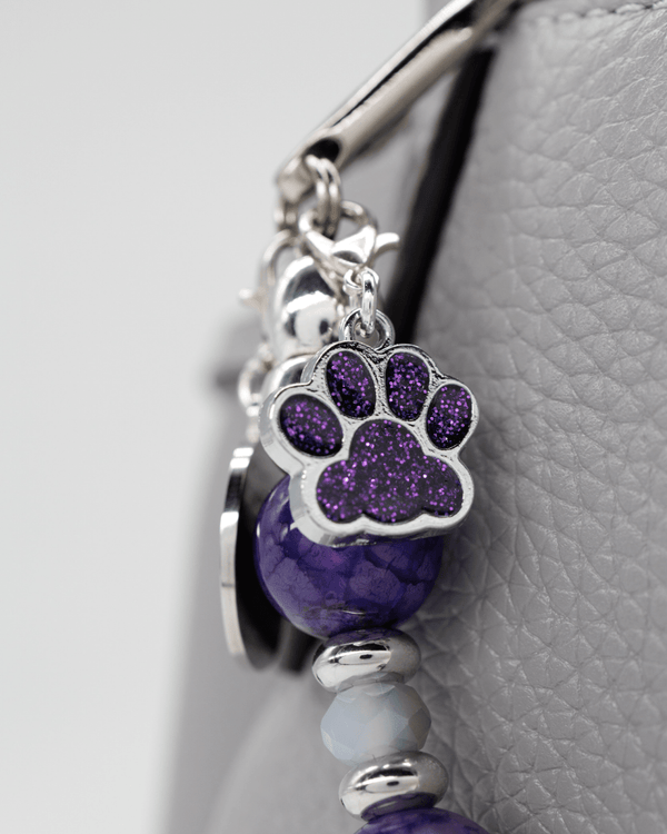 Purple sparkling dog paw charm