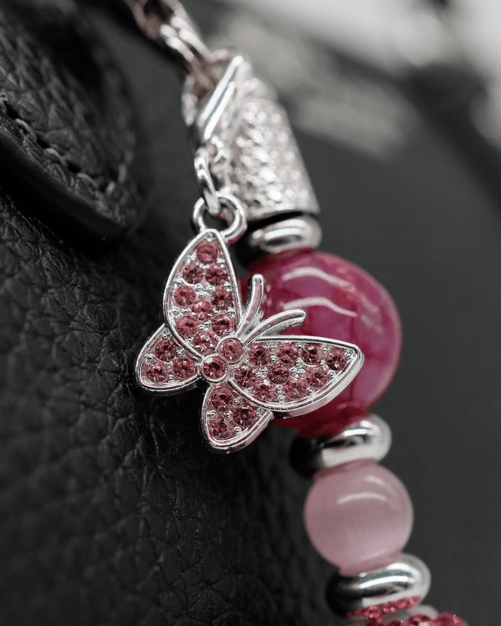 Platinum plated pink rhinestone butterfly charm
