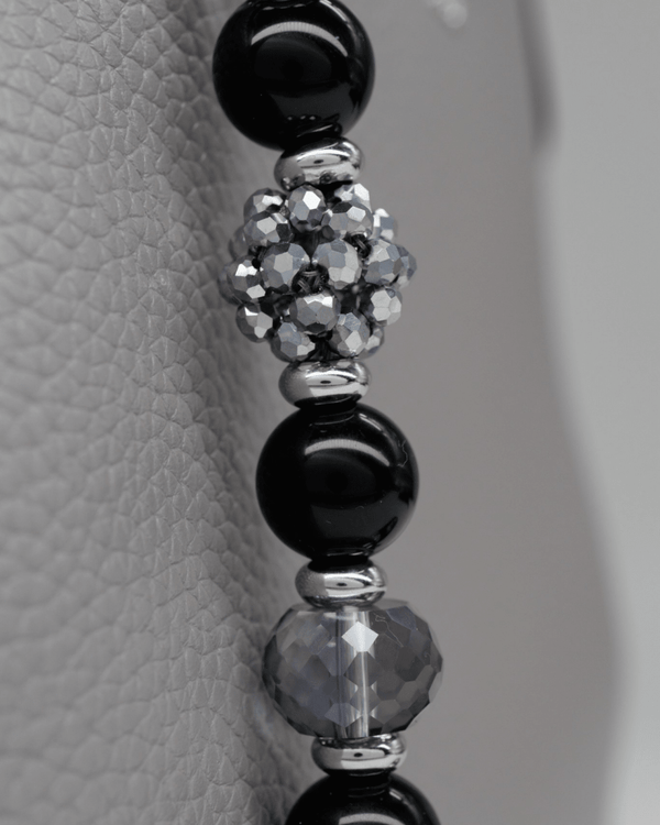 Handwoven electroplated glass center bead