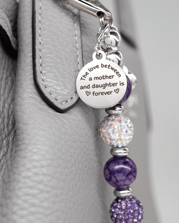 Polished stainless charm