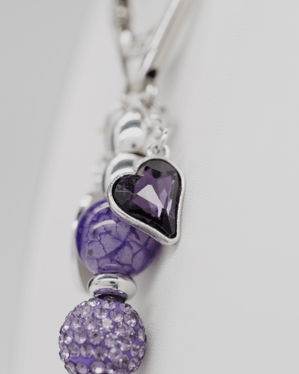 Purple faceted glass heart charm