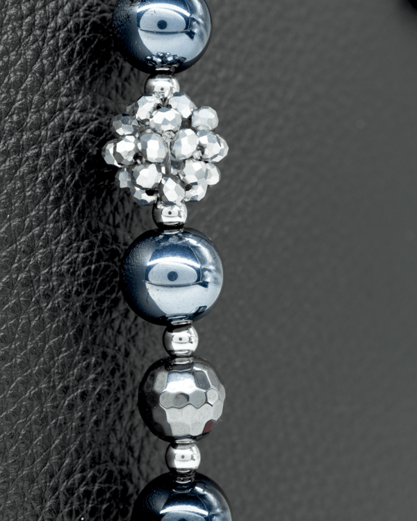 Handwoven electroplated glass center bead