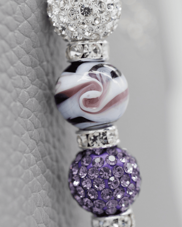 Hand-blown purple swirl glass