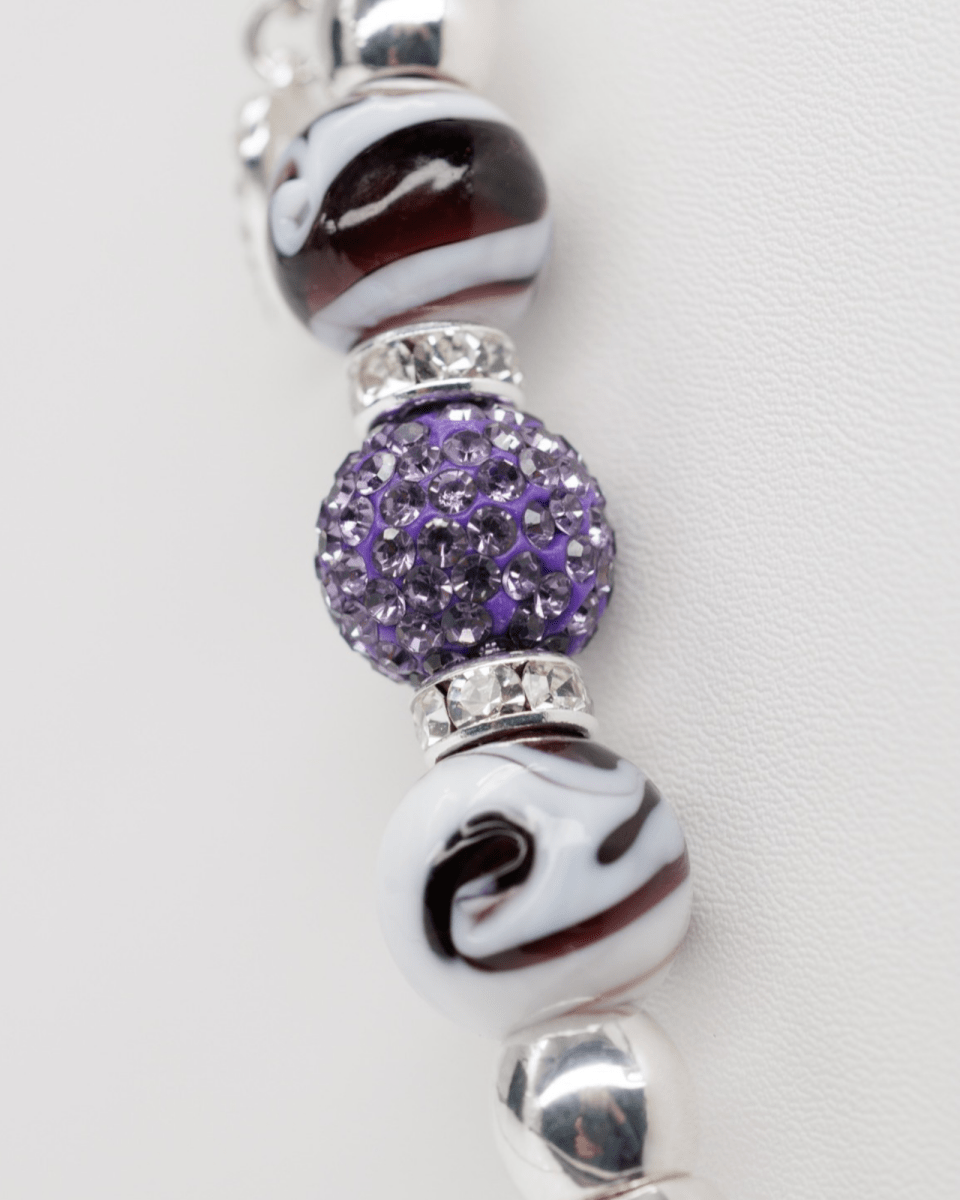 Purple Austrian crystal center beads and hand-blown swirl glass