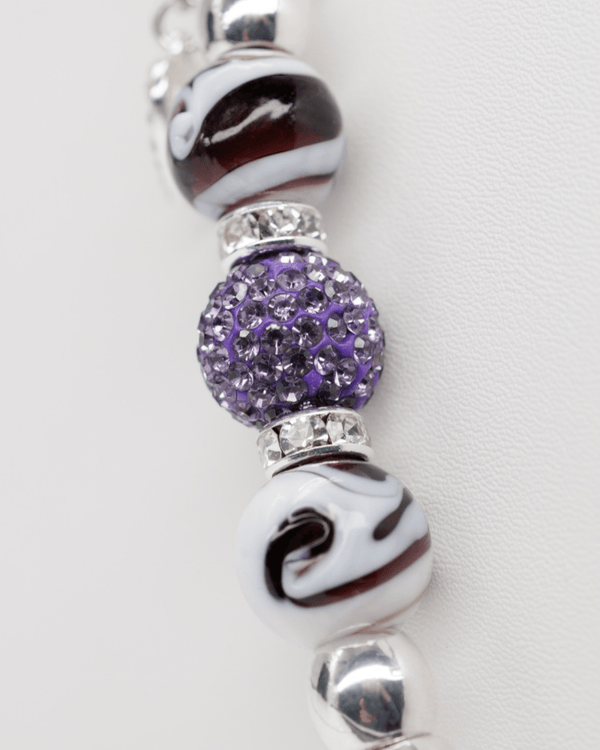 Purple Austrian crystal center beads and hand-blown swirl glass