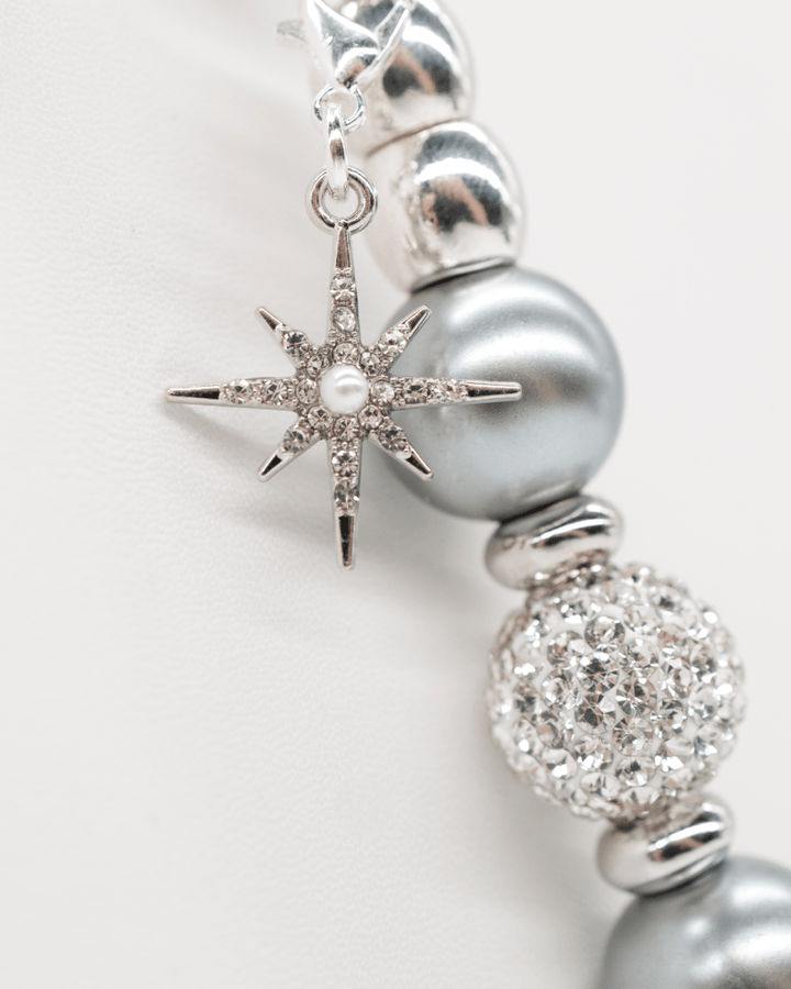 Silver plated rhinestone and faux pearl star charm