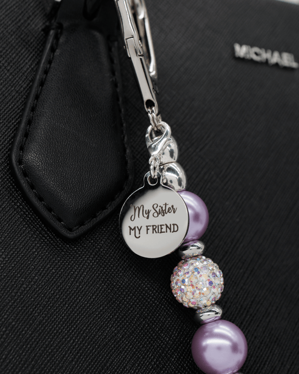 Polished stainless charm
