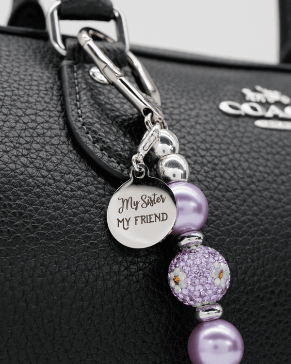 Polished stainless "my sister my friend" charm