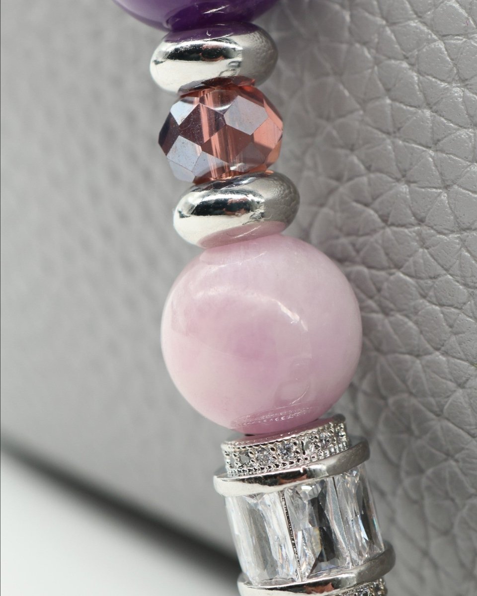 LD Keyfinder Amethyst Moon bracelet with purple amethyst, pink kunzite, and faceted glass beads, silver spacers, and rhinestone charm.