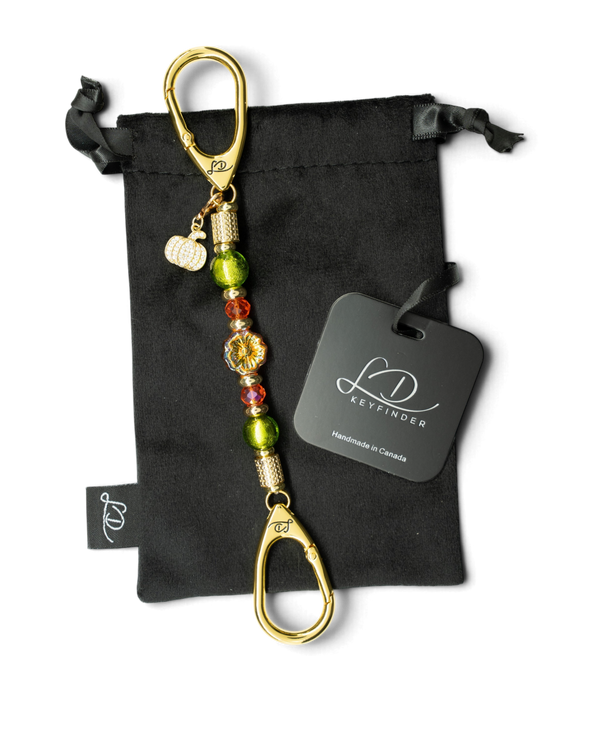 LD Keyfinder Autumn Festival-Mini keychain with green foil beads, orange glass, gold flower, and pumpkin charm.