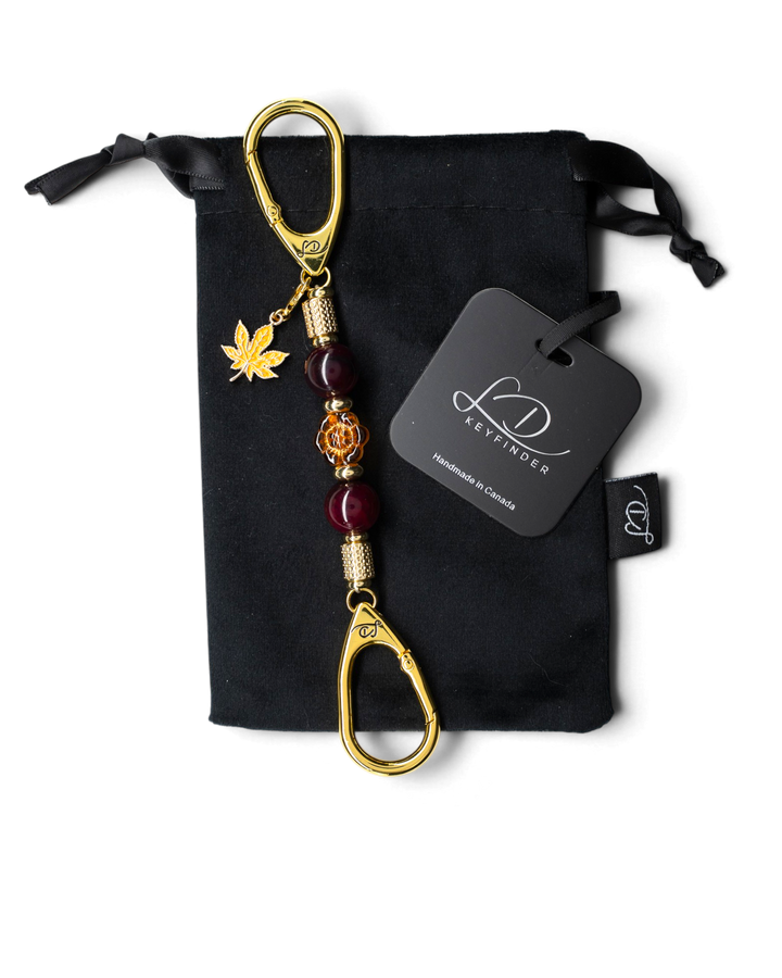 LD Keyfinder Hello Autumn-Mini keychain with burgundy agate beads, gold maple leaf charm, and glass flower bead.