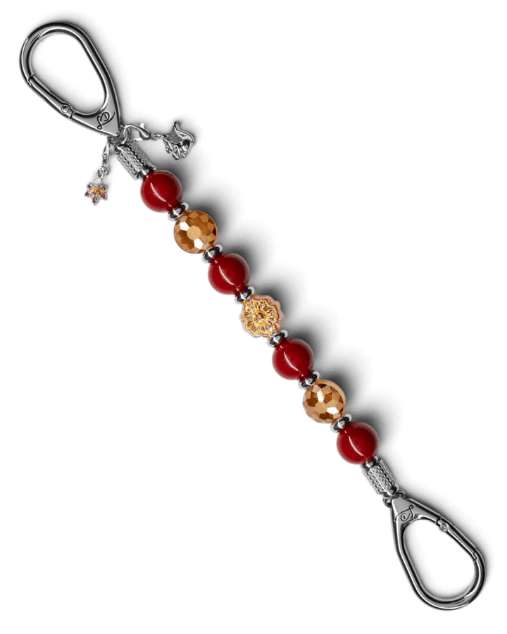 LD Keyfinder Autumn Whispers beaded keychain with red shell pearls, orange glass flower, and platinum-plated charms.