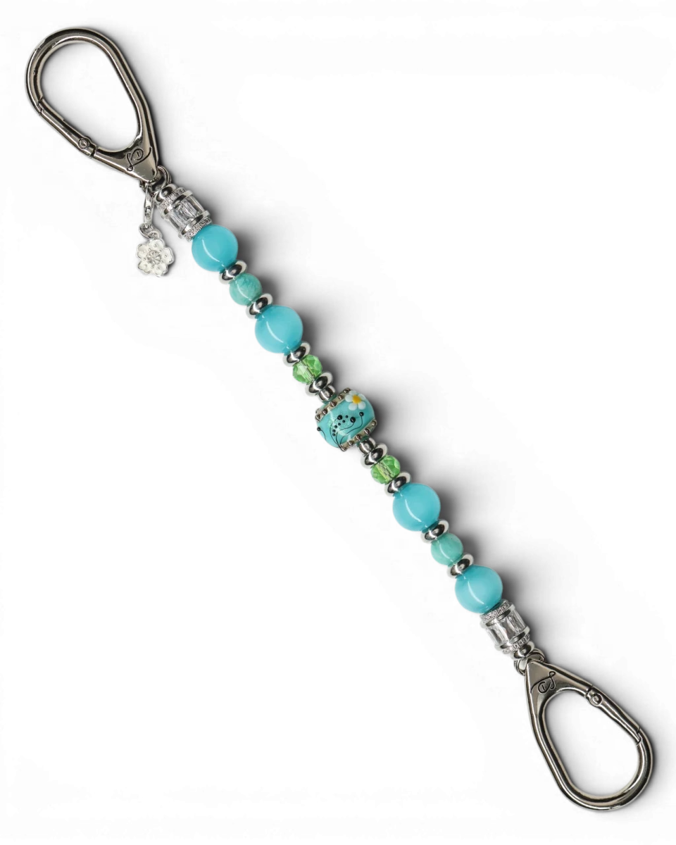 LD Keyfinder Azure Meadow keychain with aqua blue Amazonite, cat's eye beads, green glass beads, and a lampwork daisy bead.