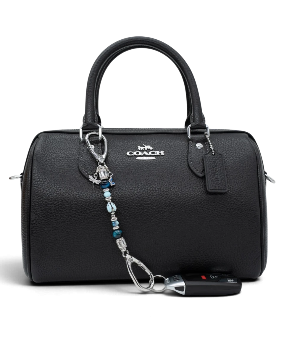 LD Keyfinder Petite Whispering Garden beaded keychain with blue glass tulip, tiger eye, and dragonfly charm on a black bag