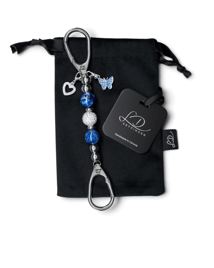 LD Keyfinder Blue Butterfly-Mini keychain with blue pearlized beads, crystal center, and heart and butterfly charms.