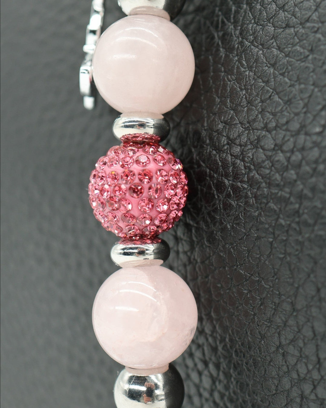 LD Keyfinder Blush Butterfly Mini bracelet with rose quartz, pink crystal bead, and silver spacers. Features a butterfly charm.