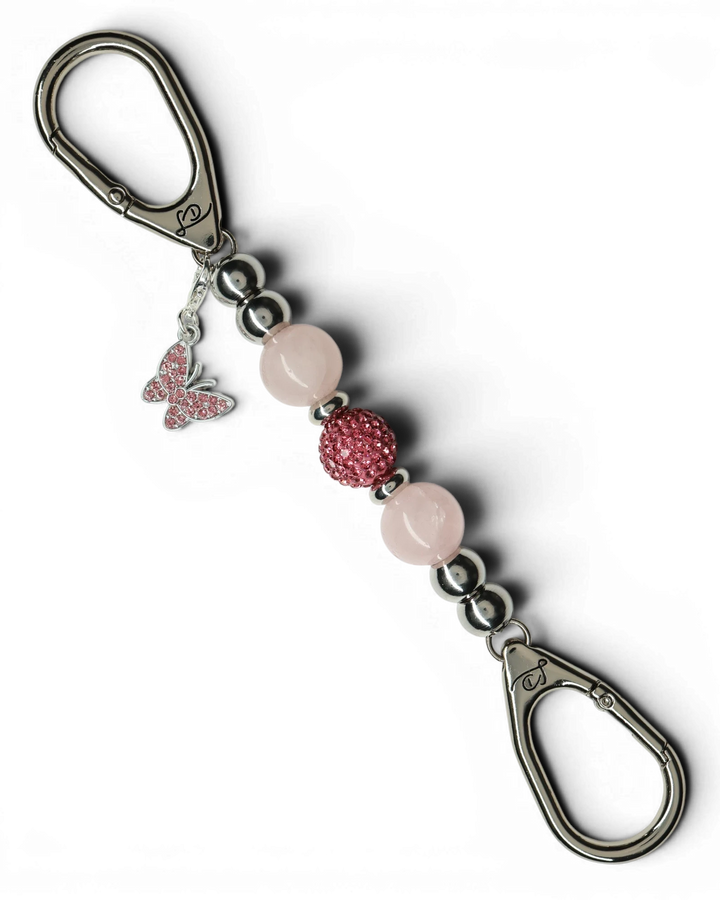 LD Keyfinder Blush Butterfly Mini keychain with rose quartz beads, pink crystal ball, and rhinestone butterfly charm.