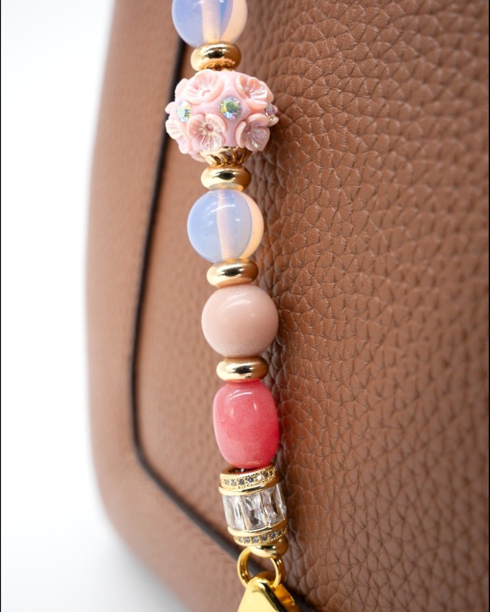 LD Keyfinder Blush Sorbetto beaded accessory with pink floral artisan bead, Rhodochrosite, Pink Opal, and gold accents.