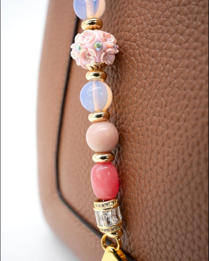 LD Keyfinder Blush Sorbetto beaded accessory with pink floral artisan bead, Rhodochrosite, Pink Opal, and gold accents.