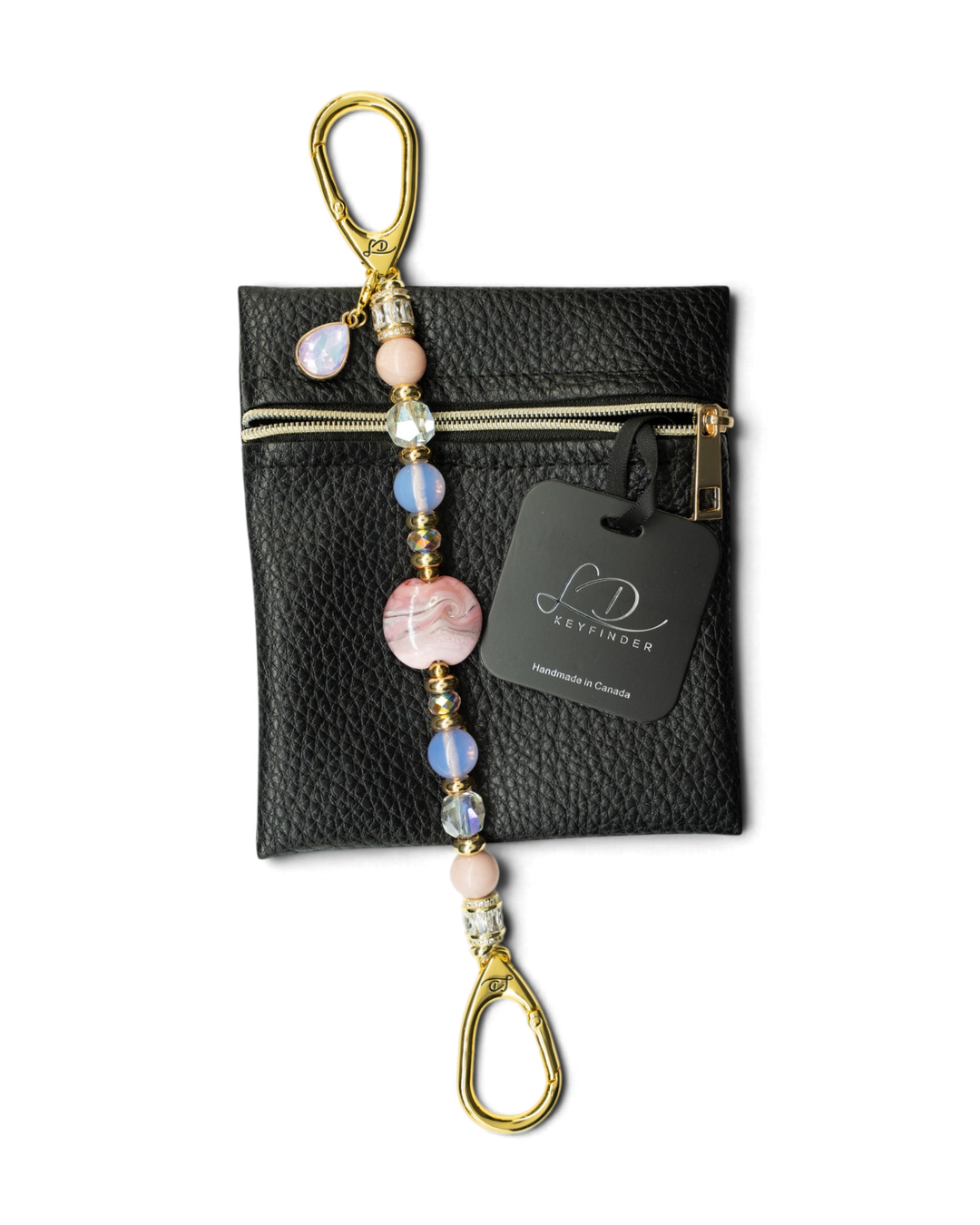 LD Keyfinder Blushing Opaline beaded keychain with pink opal, artisan glass, and gold-plated accents on a leather pouch