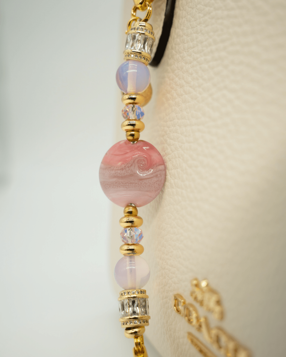 LD Keyfinder Blushing Opaline Petite featuring pink artisan glass, opalite beads, and 18KT gold-plated accents.