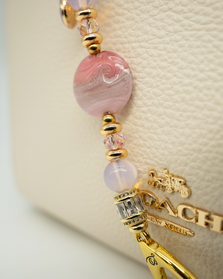LD Keyfinder Blushing Opaline Petite featuring pink artisan glass, opalite beads, and 18KT gold-plated accents.