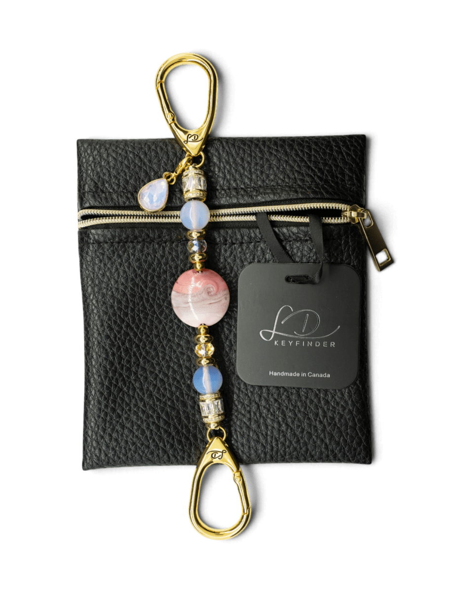 LD Keyfinder Blushing Opaline Petite with pink opalite beads, artisan glass centerpiece, and gold-plated hardware.