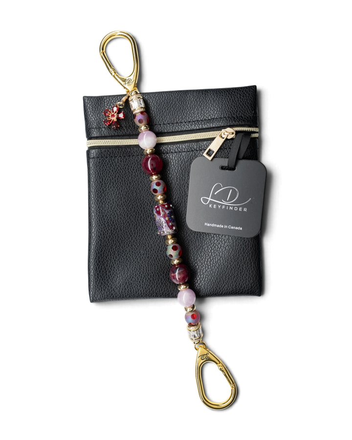 LD Keyfinder Bordeaux Bloom beaded keychain with burgundy agate, lavender kunzite, and gold-plated flower charm.