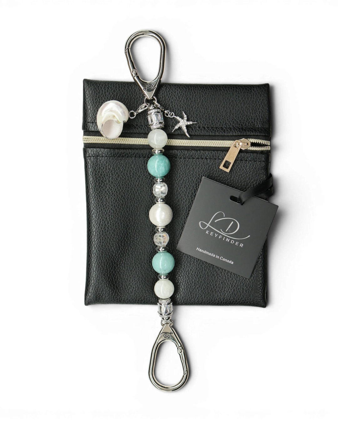 LD Keyfinder Caribbean Pearl beaded keychain with aqua jade, moonstone, shell pearl, and starfish charm on black pouch