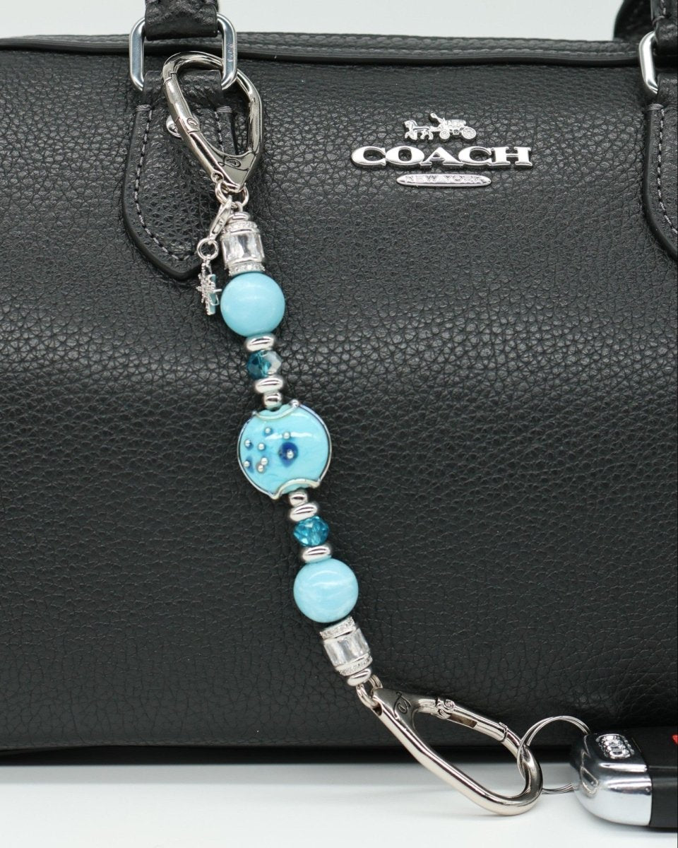 LD Keyfinder Petite Celestial Tide keychain with turquoise, aqua, and silver beads and a star charm.