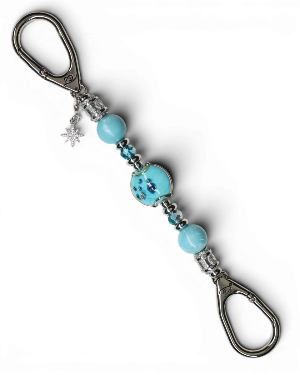 LD Keyfinder Petite Celestial Tide keychain with turquoise, aqua, and silver beads, and a star charm.