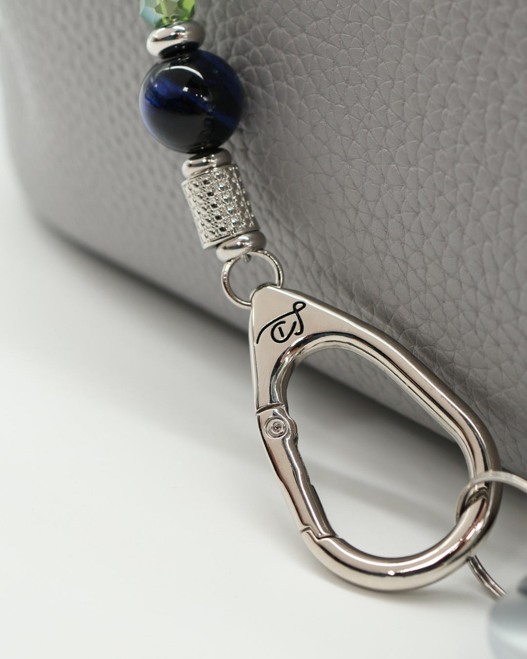 LD Keyfinder Courtside Bliss beaded keychain with blue tiger eye, green agate, and a pickleball paddle charm.
