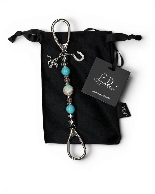 LD Keyfinder Cowgirl Dreams-Mini keychain with turquoise, jasper, and horse charms on a black velvet pouch.