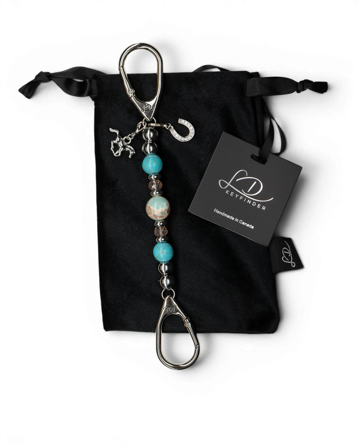 LD Keyfinder Cowgirl Dreams-Mini keychain with turquoise, jasper, and horse charms on a black velvet pouch.
