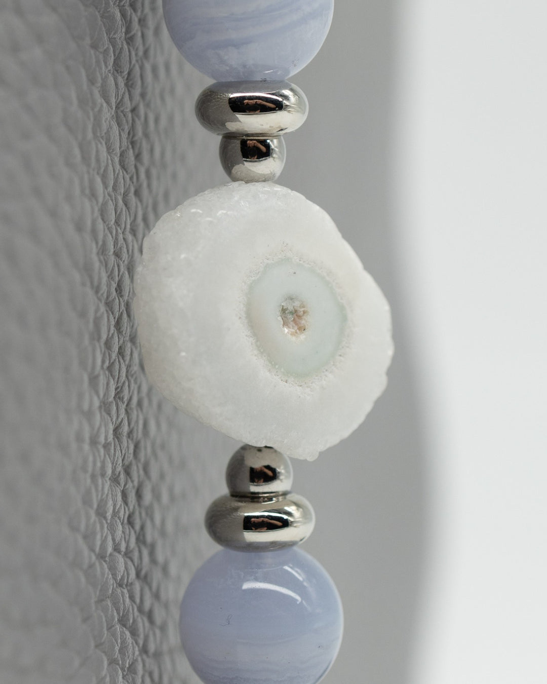 LD Keyfinder Cloud Dancer featuring blue lace agate, rainbow moonstone, and a natural sunflower druzy agate slice.