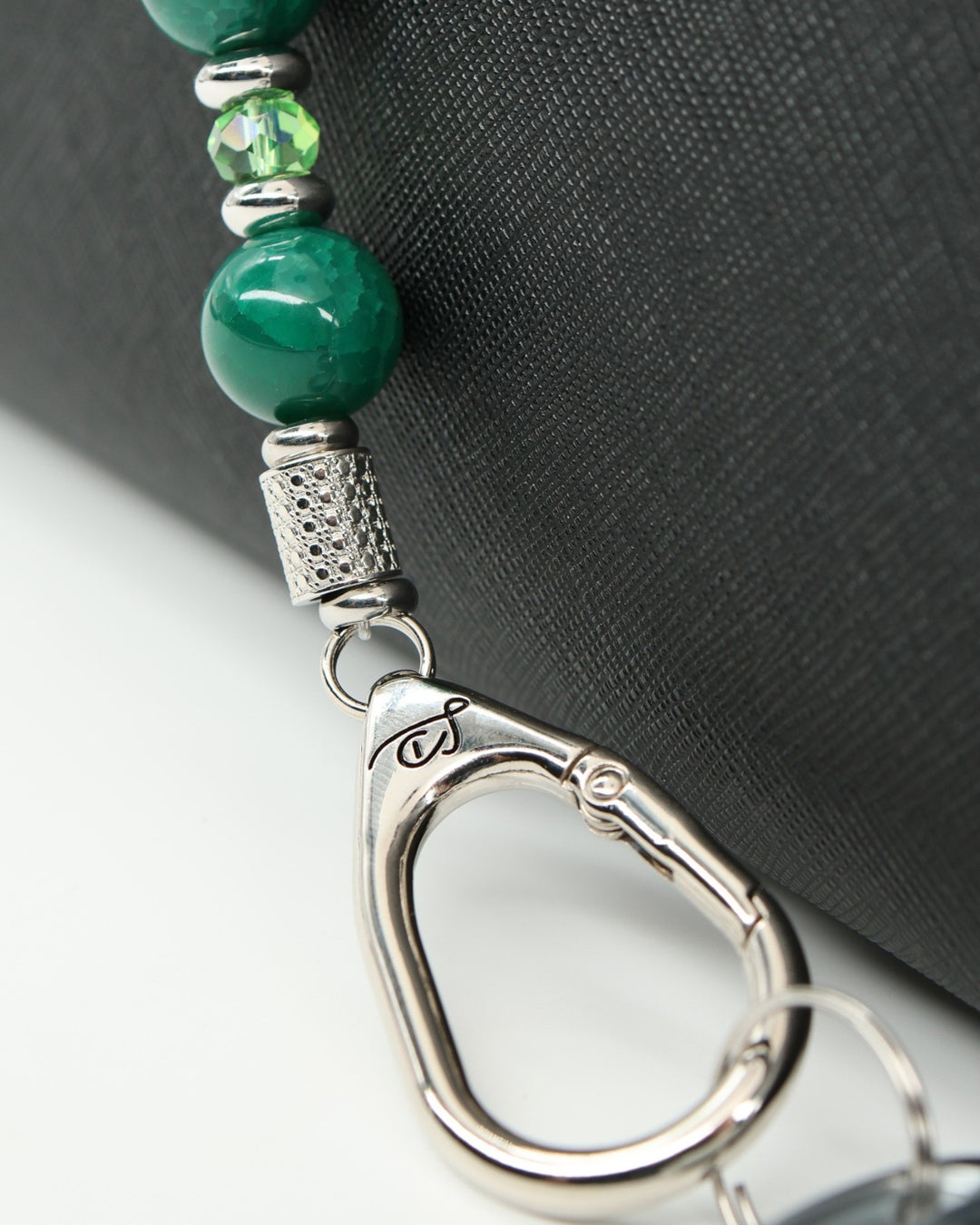 LD Keyfinder Emerald Links beaded keychain with green agate, Austrian crystal, and a golf bag charm.