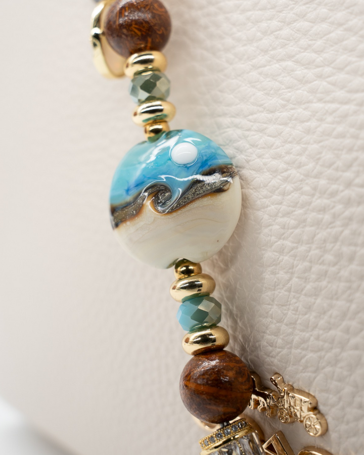 LD Keyfinder Petite Equinox Harmony featuring a handcrafted moon glass bead, jasper, blue jade, and gold-plated accents.