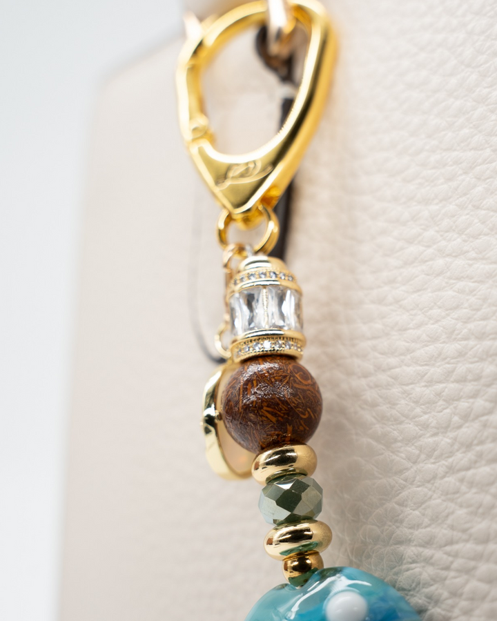 LD Keyfinder Petite Equinox Harmony featuring a handcrafted moon glass bead, jasper, blue jade, and gold-plated charm.