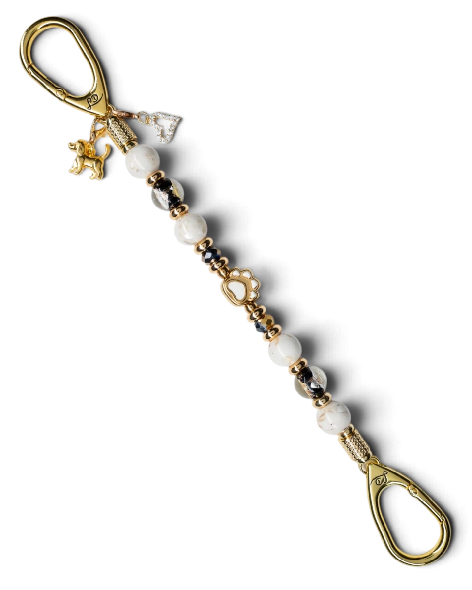 LD Keyfinder Furever Love keychain with white seashell beads, gold paw charm, and rhinestone heart on gold hardware.