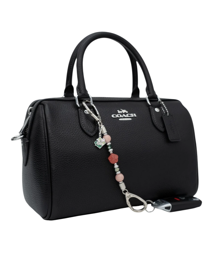 LD Keyfinder Garden Bliss-Mini accessory with pink opal, cherry quartz flower, and green beads on a black handbag
