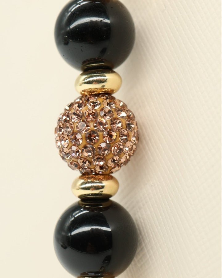 LD Keyfinder Gilded Bee bracelet with black obsidian, gold crystal beads, and a bee charm.